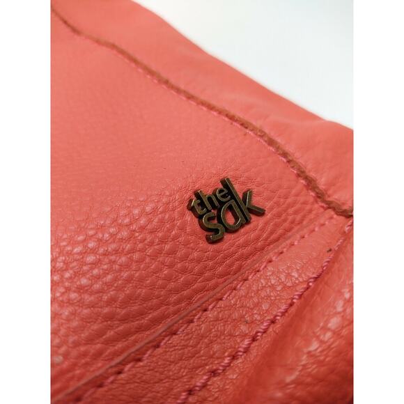 The Sak Orange Pebbles Leather Pocket Zipper Closure Crossbody Bag - Picture 9 of 12